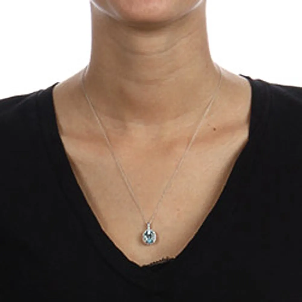 10k White Gold Oval Blue Topaz and Diamond Halo Pendant Necklace
