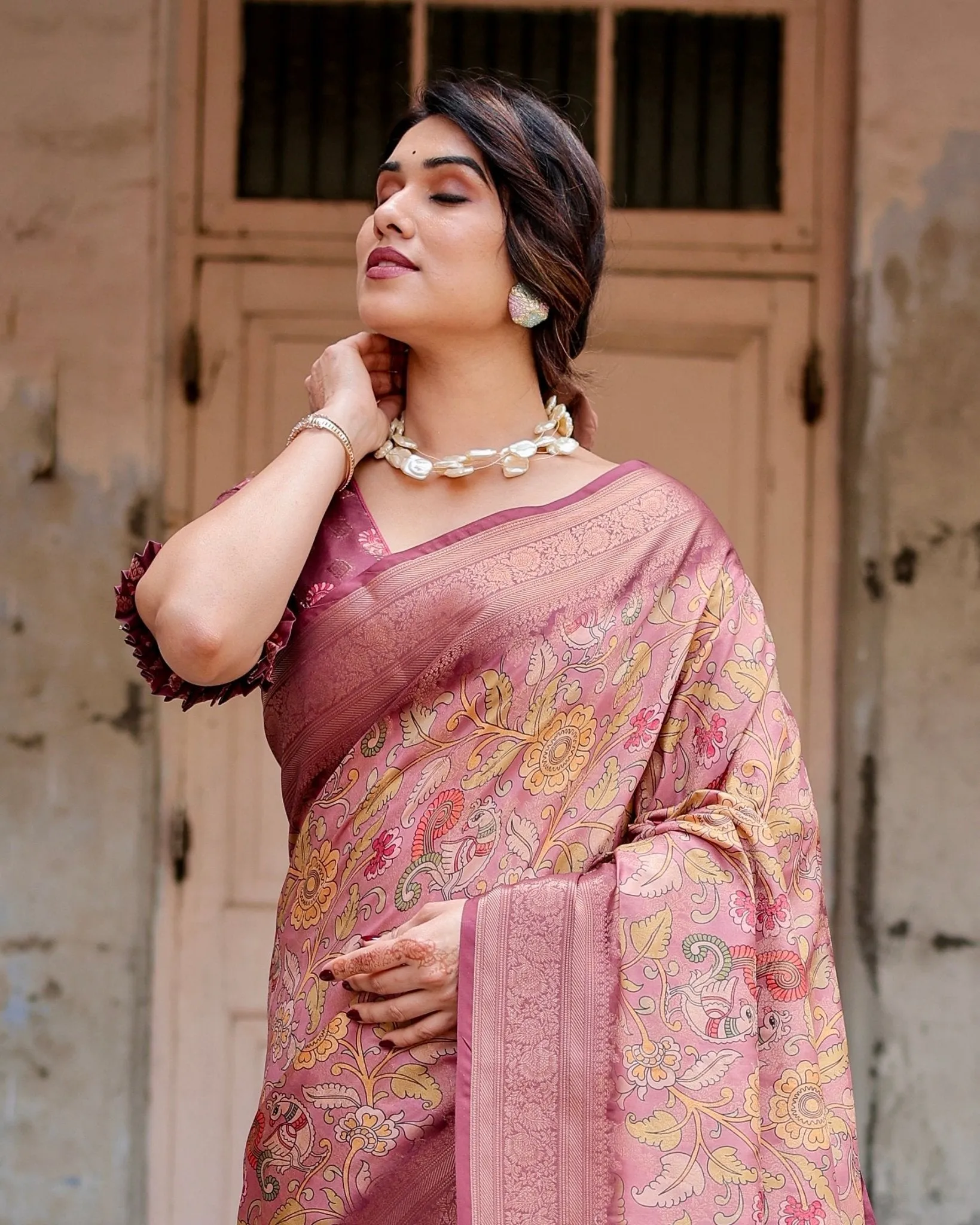 Elegant Pink Banarasi Silk Saree with Floral Zari Weaving and Tassel-Embellished Pallu