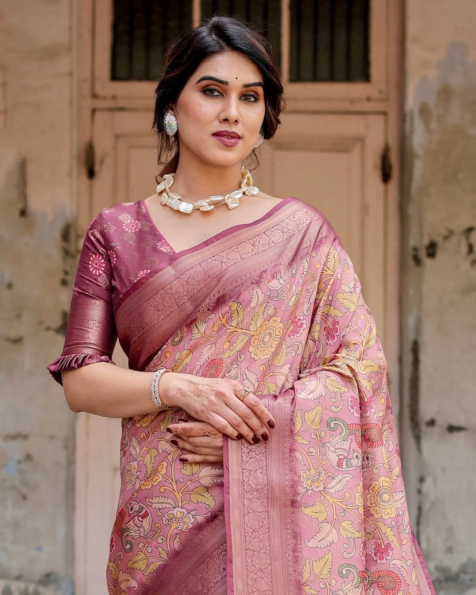 Elegant Pink Banarasi Silk Saree with Floral Zari Weaving and Tassel-Embellished Pallu