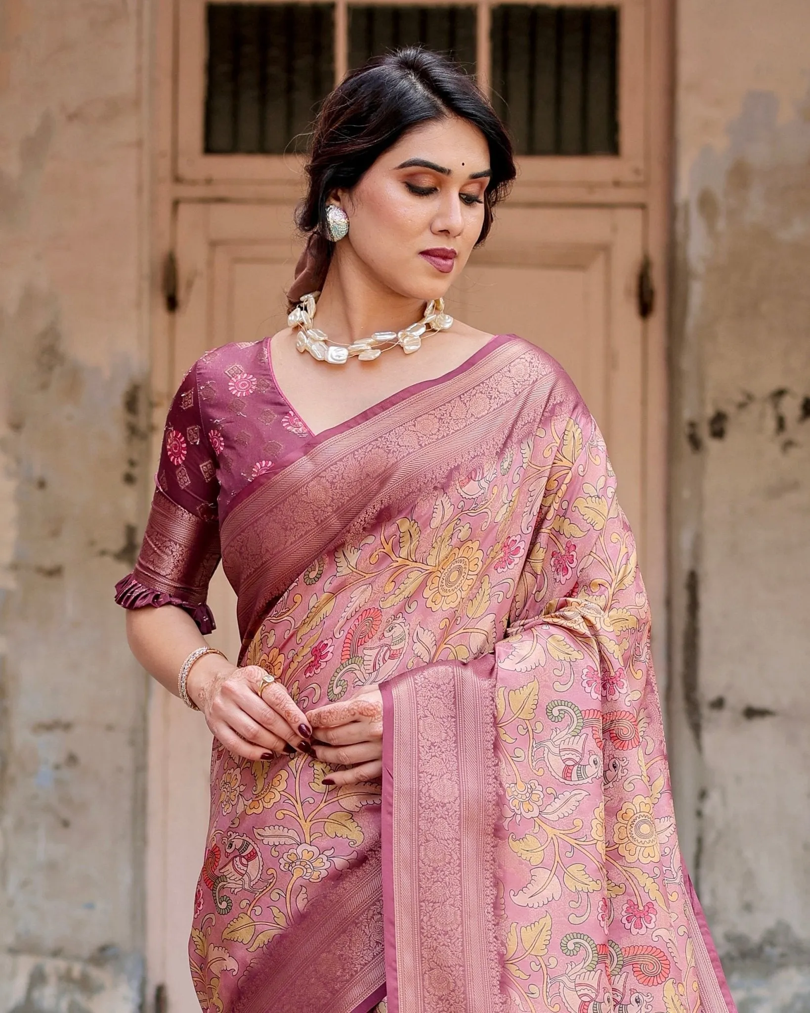 Elegant Pink Banarasi Silk Saree with Floral Zari Weaving and Tassel-Embellished Pallu