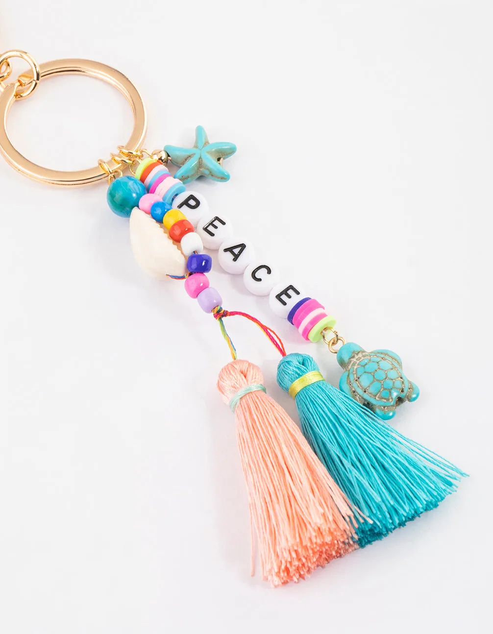 Gold Peace Tassel Key Ring