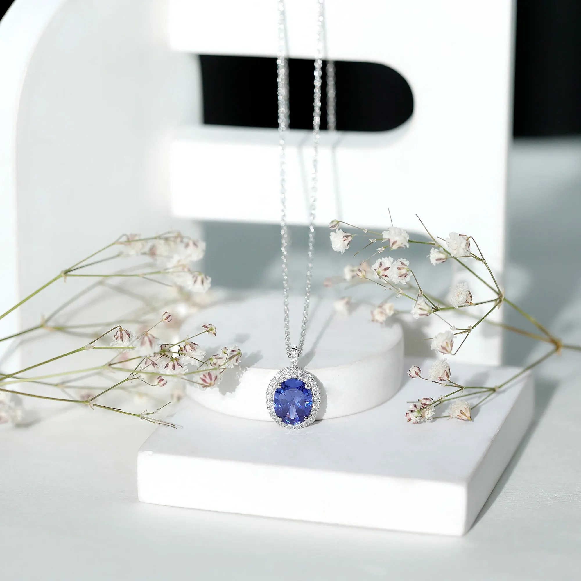 Oval Cut Created Blue Sapphire Silver Halo Pendant with Moissanite