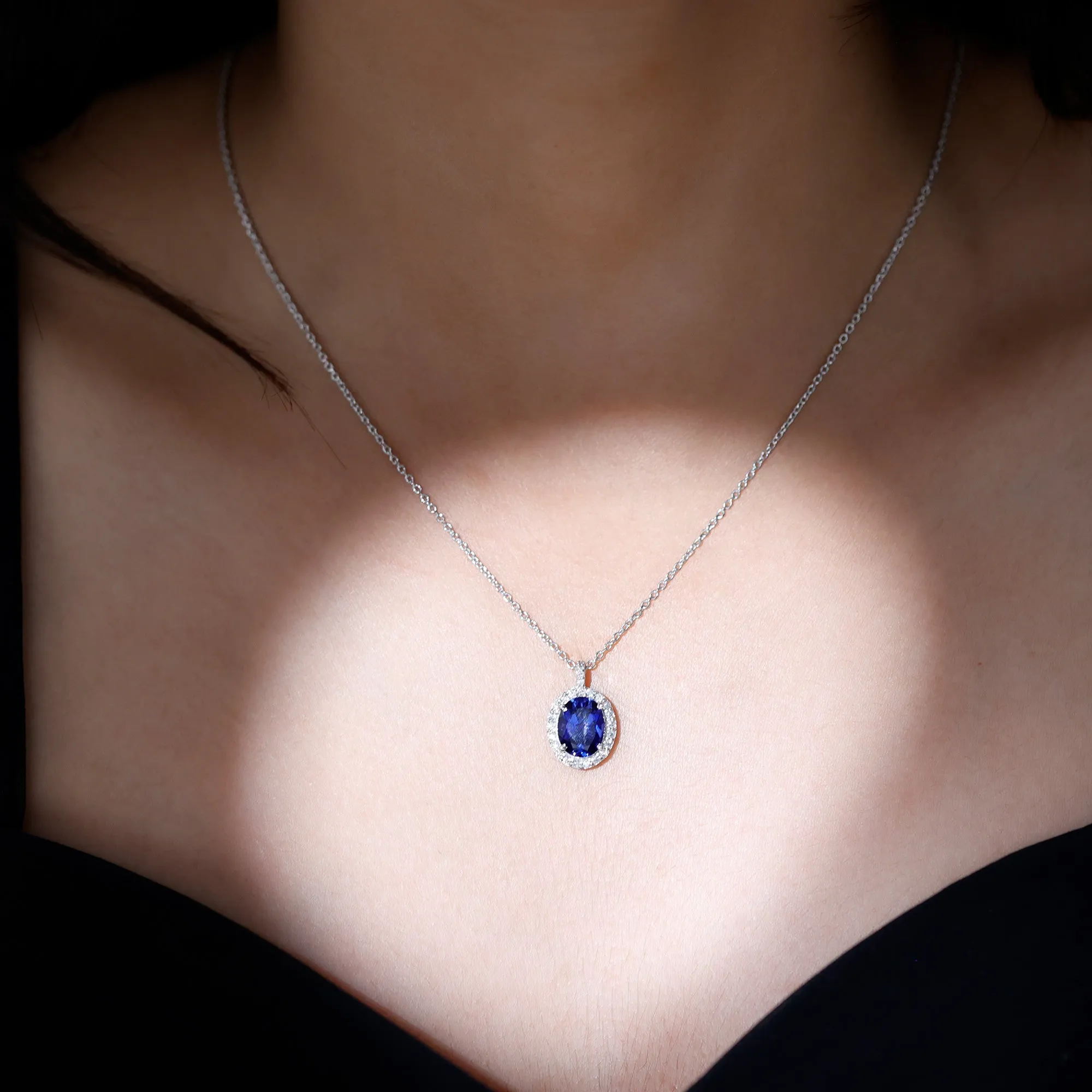Oval Cut Created Blue Sapphire Silver Halo Pendant with Moissanite