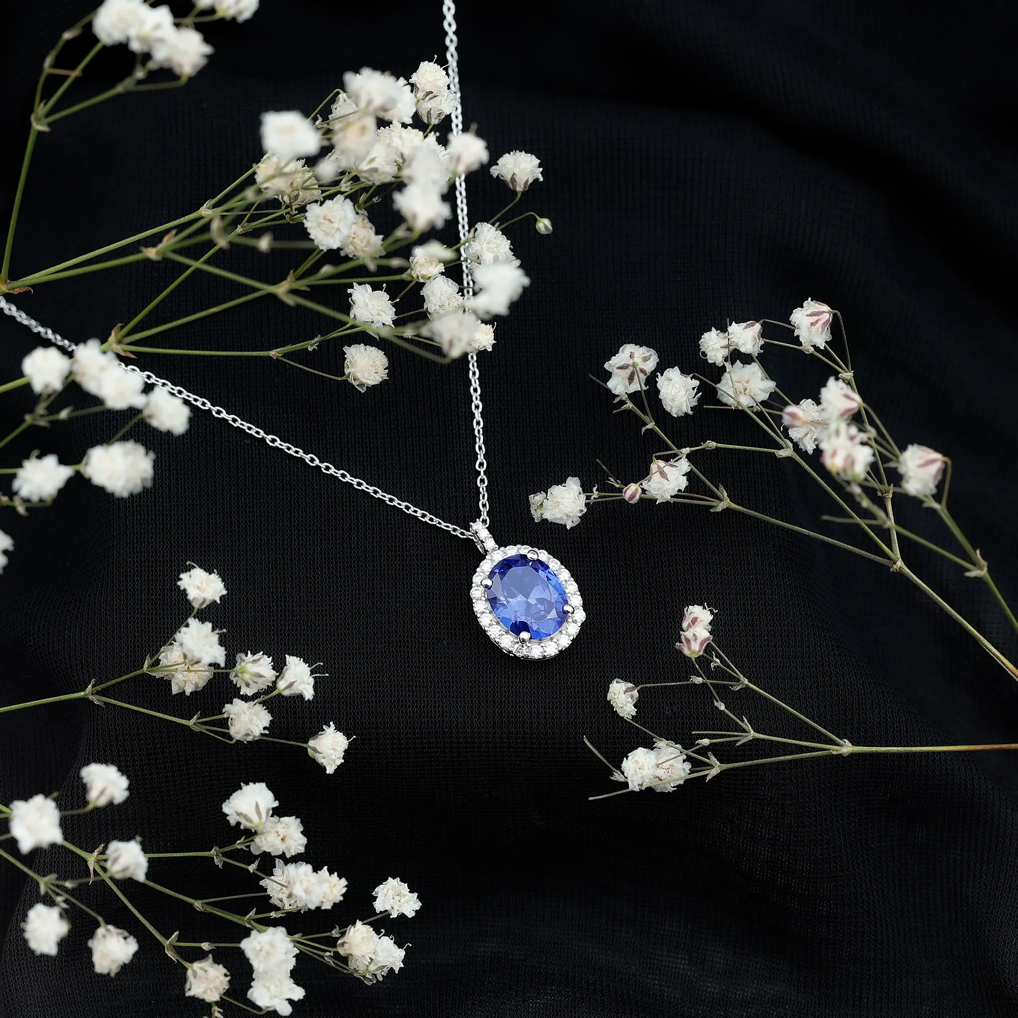 Oval Cut Created Blue Sapphire Silver Halo Pendant with Moissanite