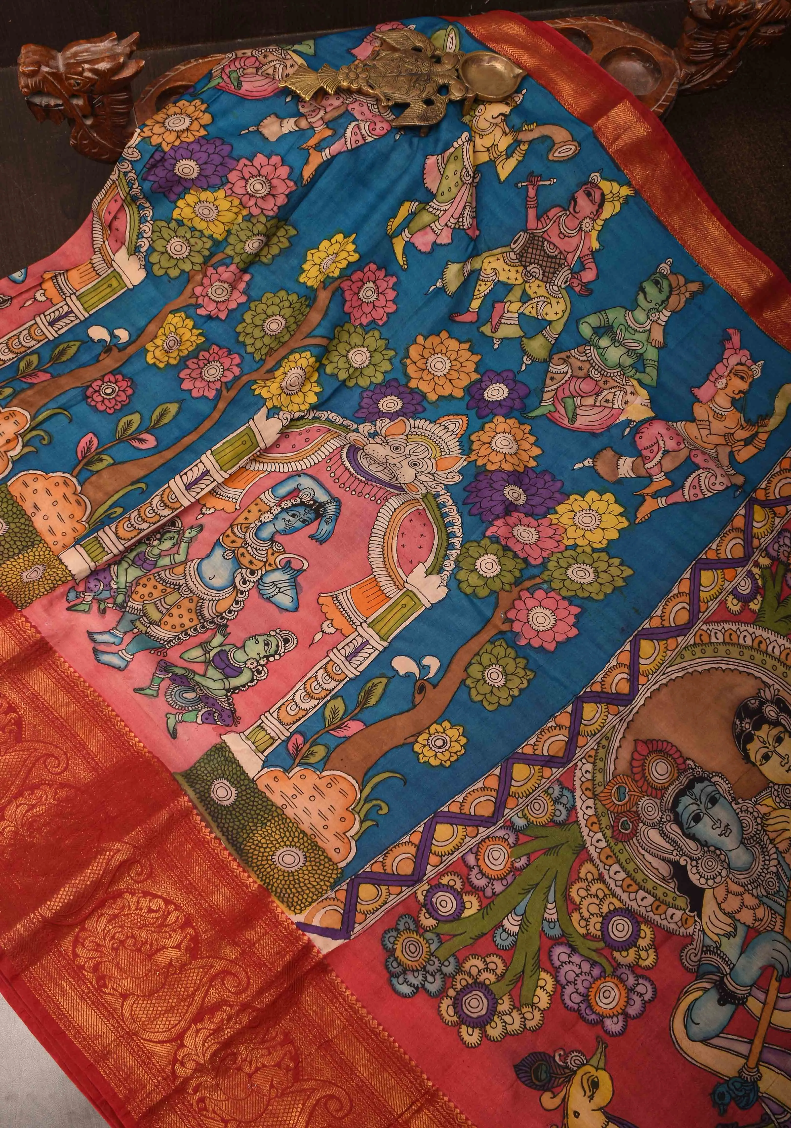 Radhakrishna and Dancing Queens : Authentic Pen kalamkari on pure Chennuri Silk Saree with Wide Zari Border