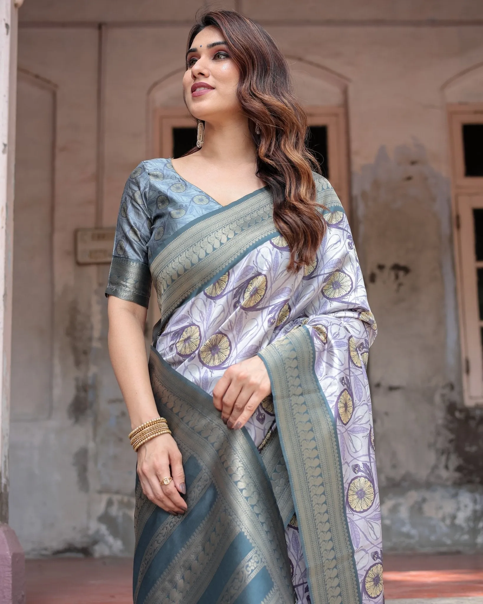 Sophisticated Lilac Banarasi Silk Saree with Floral Prints and Zari Tassel Border
