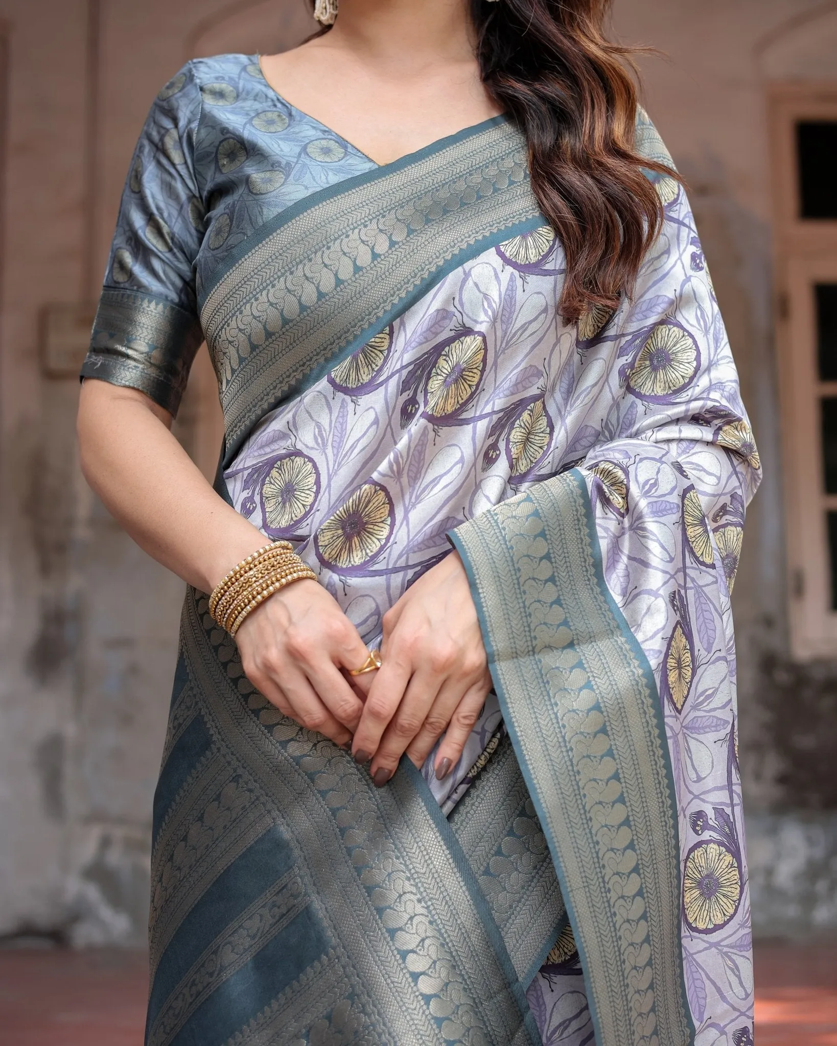 Sophisticated Lilac Banarasi Silk Saree with Floral Prints and Zari Tassel Border